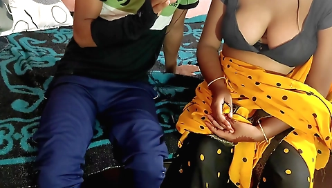 Indian brunette gives a handjob to her stepbrother