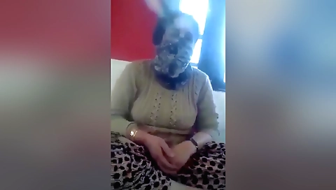 Mature brunette 18+ babe is showing her legs on webcam