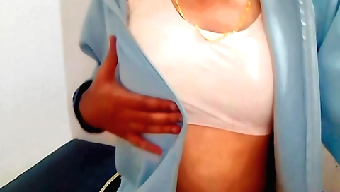 Indian woman in a sexy dress gets naked in the backyard