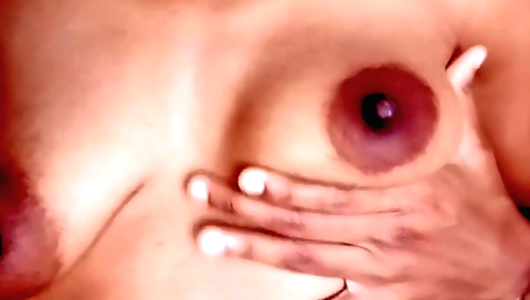 Indian babe plays with her body while holding a hand