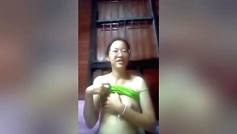 Horny Indian babe in a sexy lingerie has a solo video