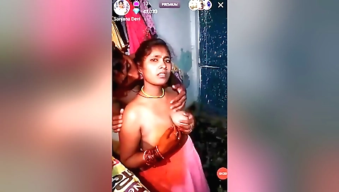 Amateur brunette showing off her big tits on webcams