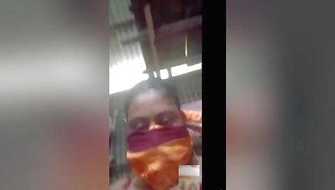 Indian babe with big boobs gets on the phone with her boyfriend