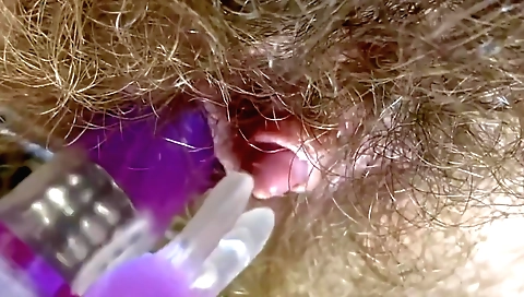 Amateur girl with a nice face is giving a blowjob to her big toy