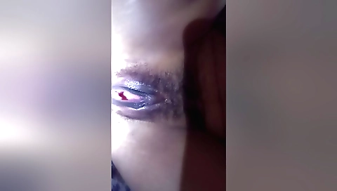 Hairy girl with a shaved pussy is getting a blowjob