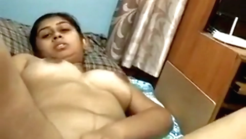 Indian brunette with big natural tits fingering herself