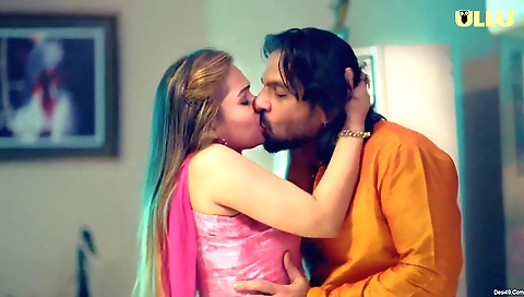 Busty brunette in a sexy black dress and white blouse