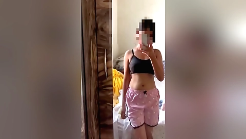 Busty brunette girl in black dress and stockings is naked