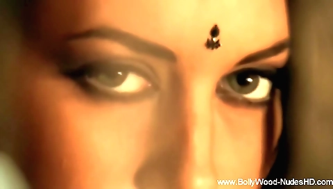 Stunning brunette with a sexy face showing off her curves