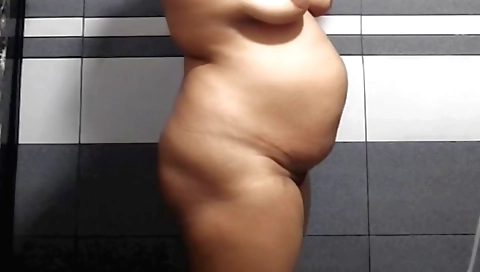 Indian babe in a white bikini and panties shows off her body