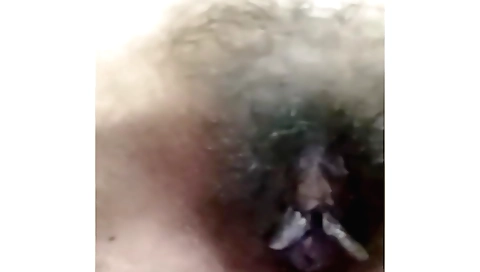 Busty indian babe with hairy pussy and face takes a hot selfie