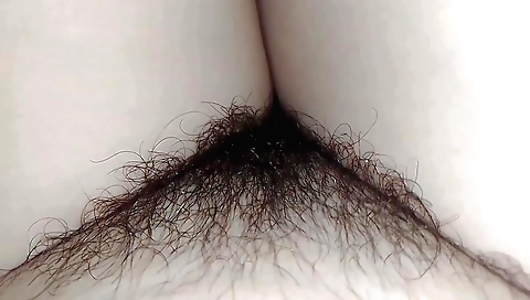 Indian teen is showing off her hairy pussy in the shower