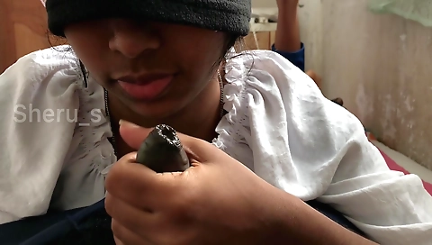 Indian brunette in dress gives a handjob to her lover