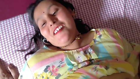 Indian brunette in a black dress and shorts jerks her juicy hole