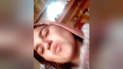 Amateur girl with big boobs playing with a big dildo