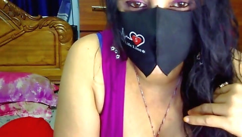 Crazy asian chick filming a video of her big boobs