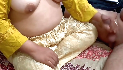 Hot brunette teen with a big ass gives a handjob to a guy