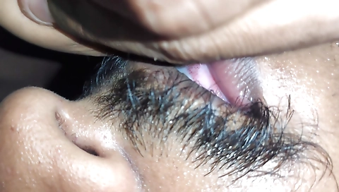 Indian wife drinking milk while she's with husband