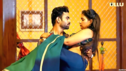 Brunette with a cute face and small tits is standing on the net