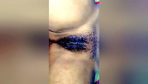 Indian girl takes a shower with the rain and gets her pussy wet