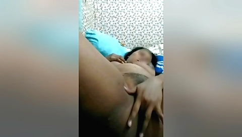 Hot brunette takes off panties and masturbates herself