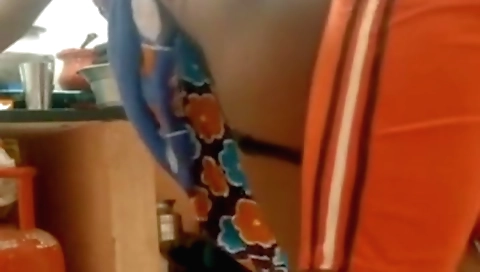 Indian porn video with big tits brunette in the kitchen