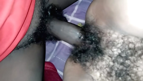 Hairy indian girl plays with her hairy pussy on bed